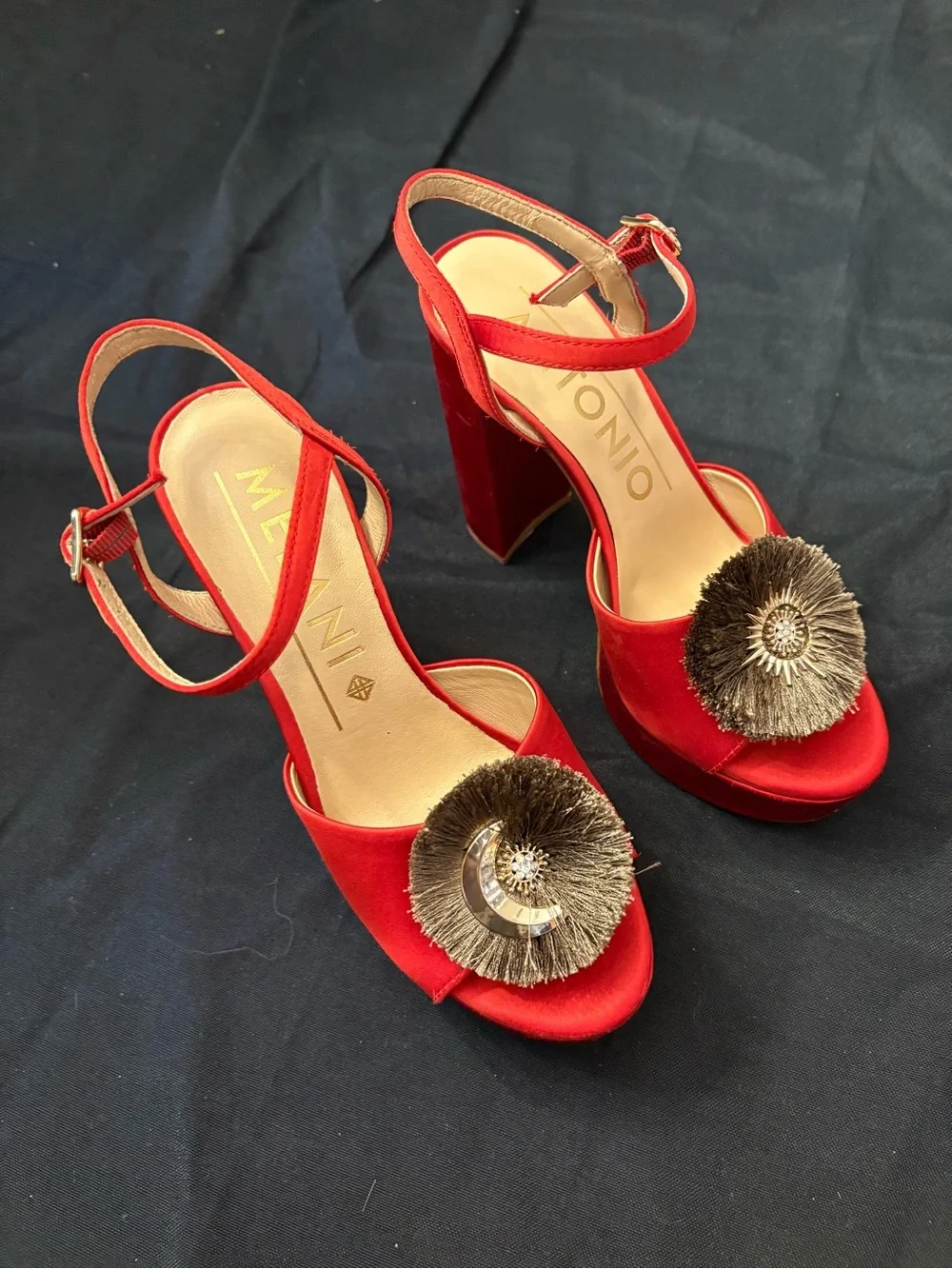 ANTONIO MELANI bold red
